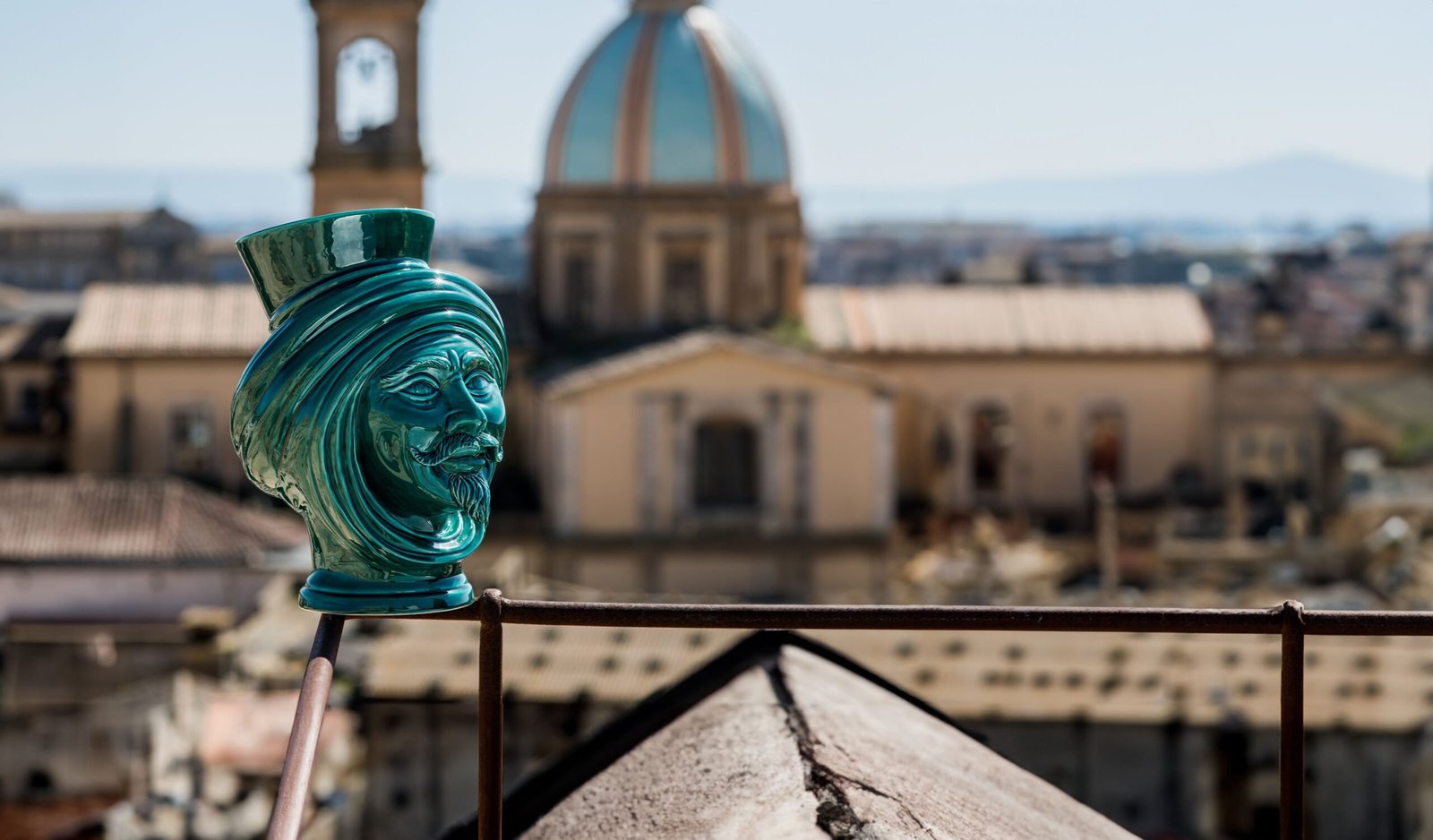 Range of Caltagirone ceramics: vases, ornamental plates, lamps and pine cones in several decoration lines