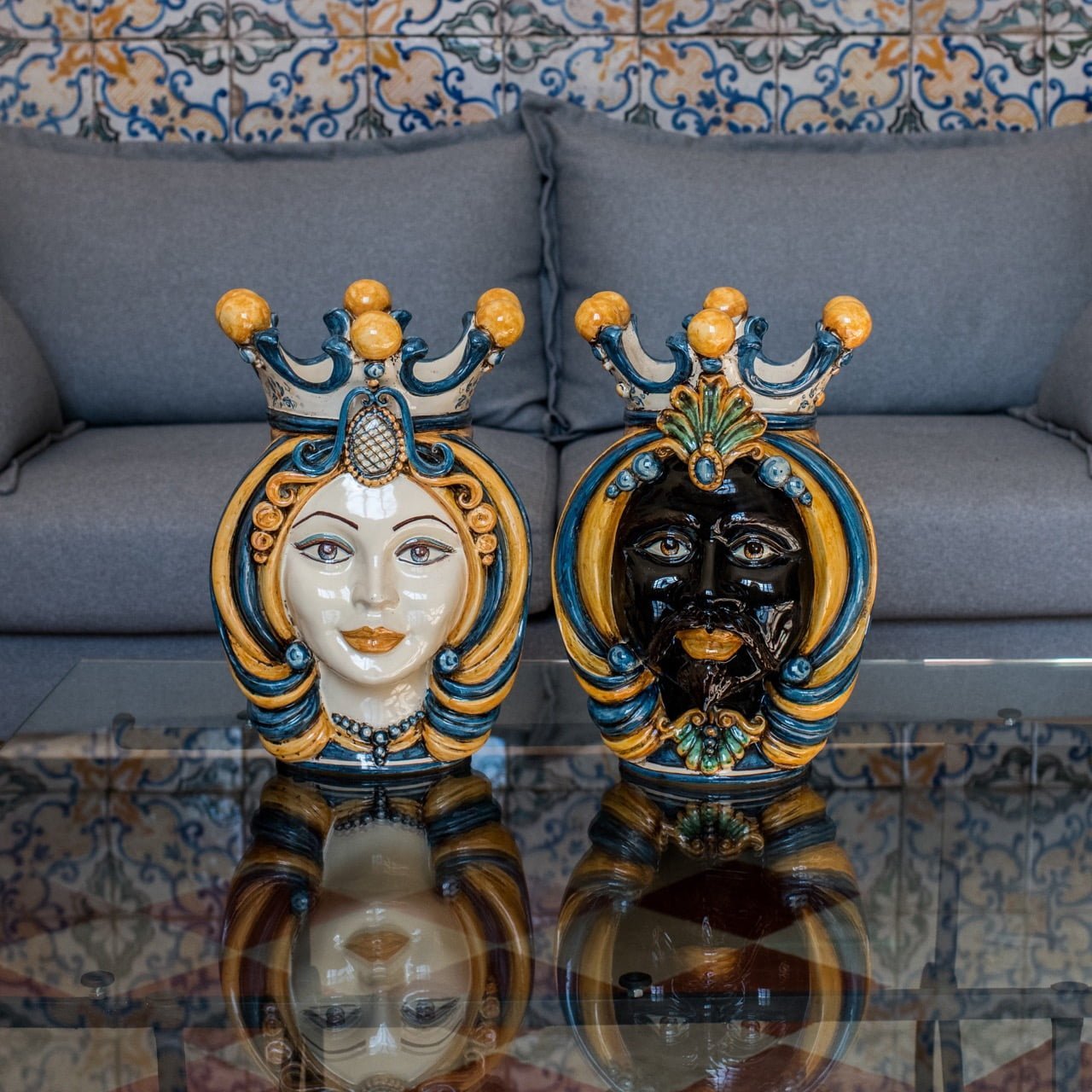 Close-up of a pair of Moor's head vases